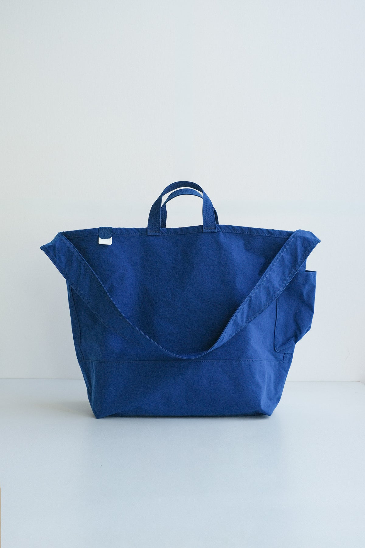 SIDE POCKET TOTE / BLUE / ANUNFOLD