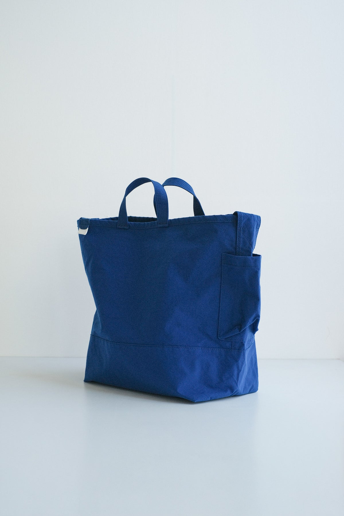 SIDE POCKET TOTE / BLUE / ANUNFOLD
