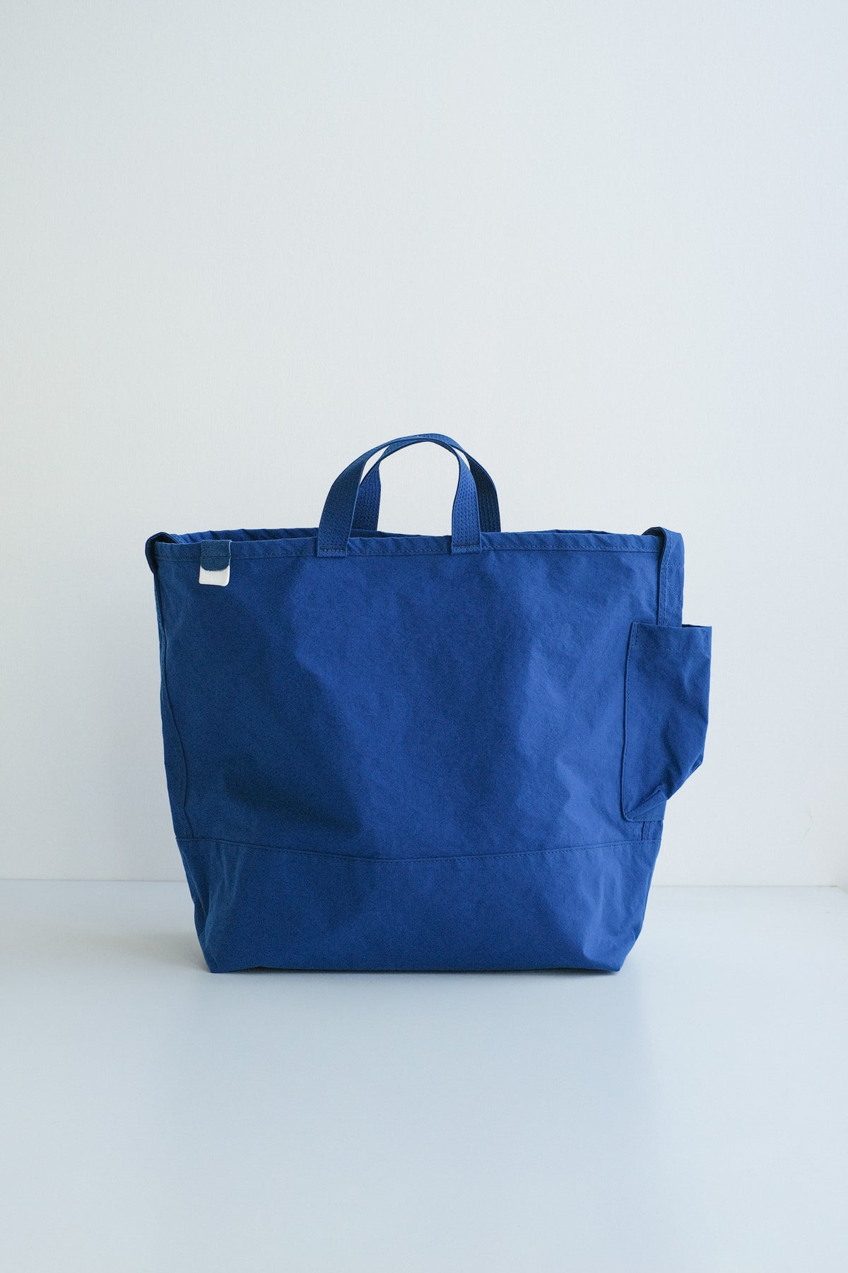 SIDE POCKET TOTE / BLUE / ANUNFOLD